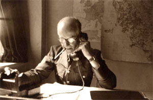 Photograph of Bertram Rota whilst working at the Photographic Reconnaissance Interpretation Unit at Medmenham.